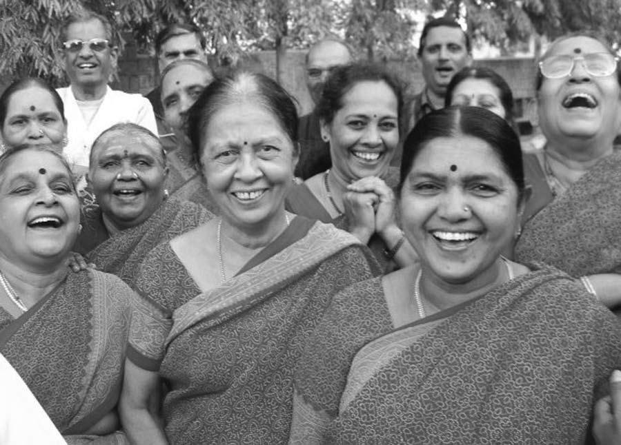 Group of ladies doing Gradient Laughter in Bangalore, India to neck exercises, because all major nerves and the spinal cord pass through the neck and control the whole body.