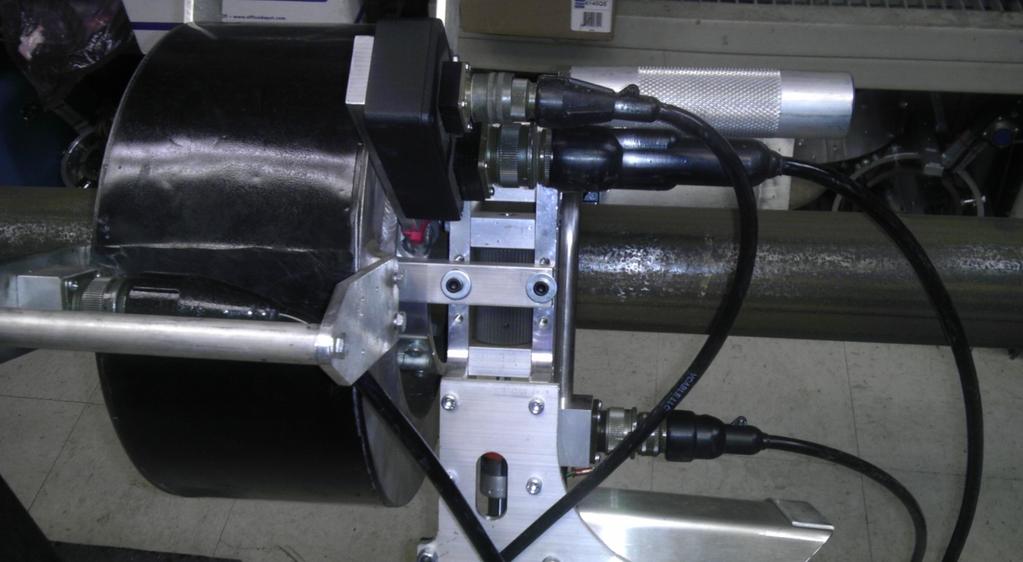 GENERAL OVERVIEW The drill pipe and tubing inspection system consists of an electronic desk connected to a motorized head through four (4) seventy (70) foot cables.