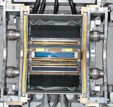 Test tank, top view Fig. 5: Testing mechanics Test tank with tube Several dimensions have been successfully tested since the machine has been set into operation.