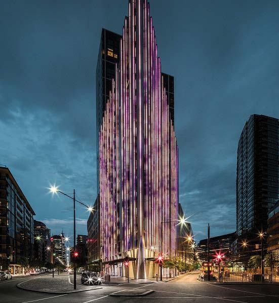 At dusk each day, the façade of 888 Collins a 15-storey residential building on the corner of Bourke and Collins streets in Docklands puts on a mesmerising light show of colours and patterns dictated