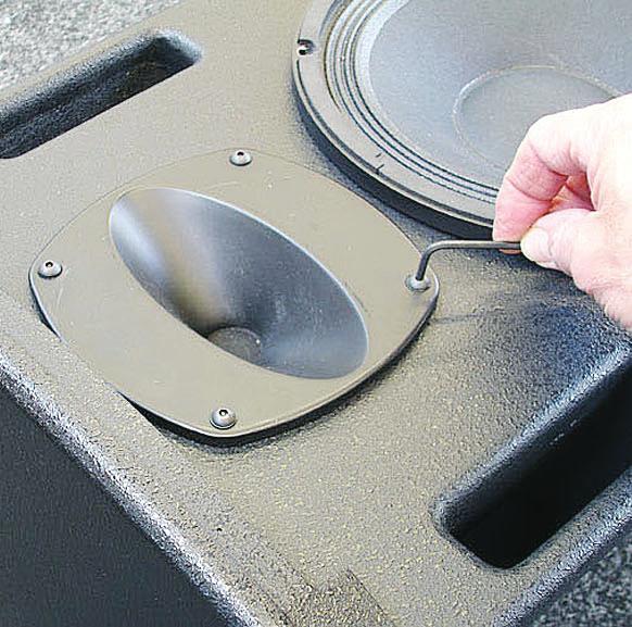 A perforated steel mesh grille backed with reticulated foam protects the drive units.
