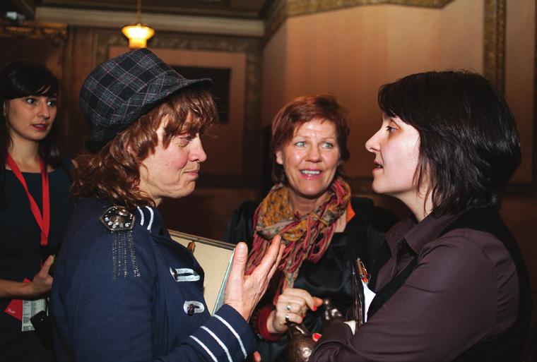 H. Kulhankova, right, converses with director