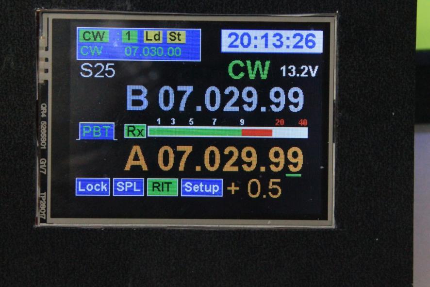 lettering and the RIT +/- frequency display appears to the far right of the setup button.