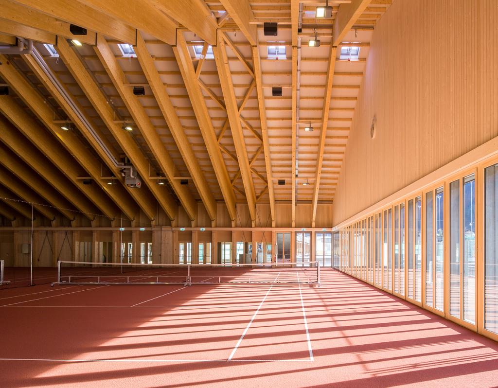 Arena 2 1300 m2 big, light wooden hall, with an allowed capacity to accommodate up to 1500 granular tennis floor is standard, optional is a robust PVC floor coating top modern tennis infrastructure,