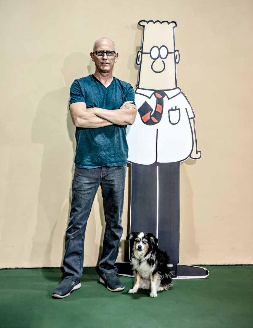 Scott Adams with a cutout of his famous