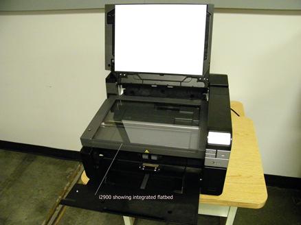 Figure 7: i2900 Scanner with flatbed cover open Exception scanning for fragile documents, books, or magazines can be accomplished by using the Kodak i2900 integrated flatbed.