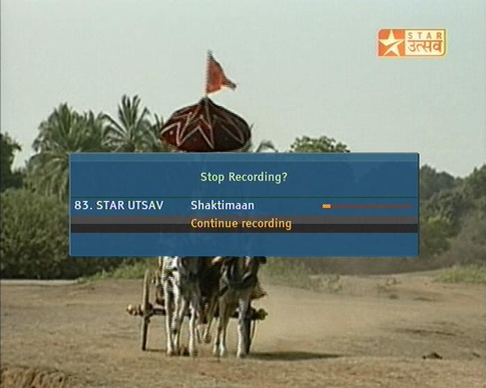 71 Recording a programme 55 To stop recording, press the button; then a box like the left figure appears, which shows the programme currently being recorded Select recording by using navigation