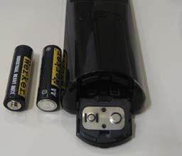 1.5.1 Insertion of Batteries in the Remote Control Insert two AA batteries into the remote control.