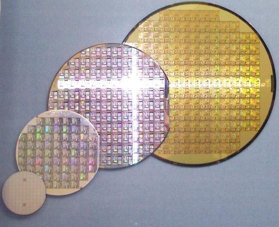 Integrated Circuit Design Cycle (Cont d) Dicing & Packaging Left: Picture of a 2-inch (51 mm), 4-inch (1 mm), 6-inch (15 mm), and 8-inch (2 mm) wafers Currently most foundries support 12-inch wafers