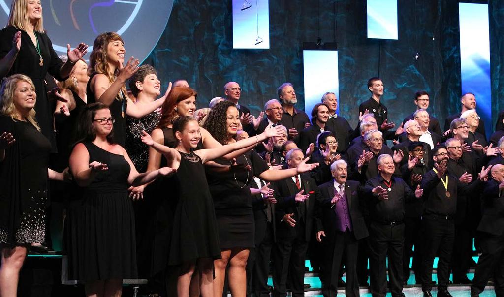 The Everyone in Harmony Chorus performed on the Saturday Night Spectacular during the International Contest in Orlando. Fathers and daughters, husbands and wives sang together for the special chorus.