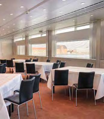 The Opera Lounge has a view of the Copenhagen harbor and accommodates between