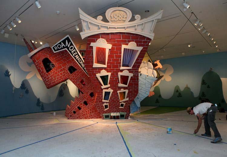Los Angeles artist and animator Wayne White created a sculpture with automated moving parts in 2012 called Big Lick Boom that paid tribute to