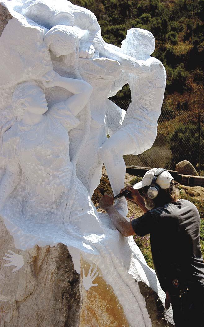 John Fisher works on an onsite carving in Santa Barbara, CA Photo courtesy of The Council for Alcohol and Drug Abuse of Santa Barbara theme. I showed him how Wolfman could turn into a crawdad.