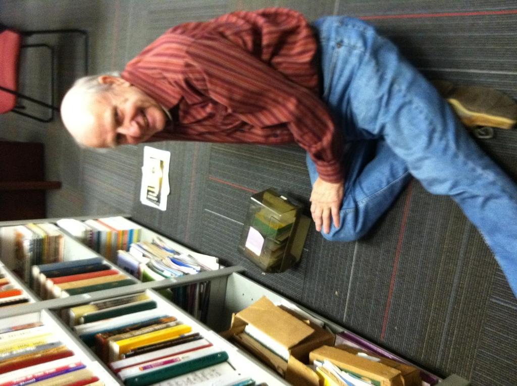 Always showing maximum effort, Dave Cisco was caught getting down with his library work.