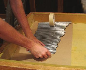 construction of reed (parlor) organs.