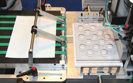 ODM engineers developed an automated, self-contained bindery system that scores, folds, and presses book blocks up to one-inch thick.