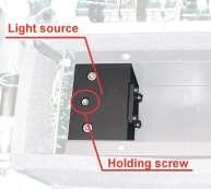 Loosen the screw connector of the lamp s power