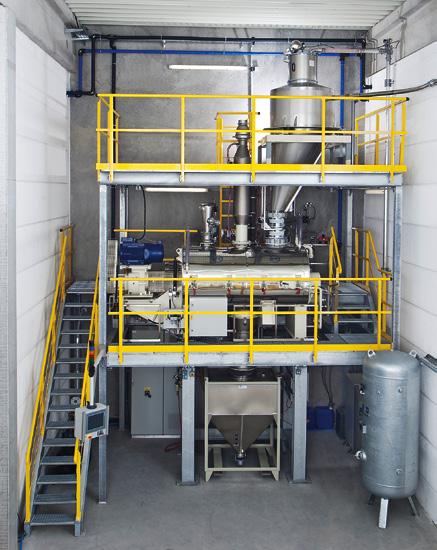 Right: A complete MTI mixing system for PE-Xa at pipe maker Agru-Frank in Germany the friction created also causes the material temperature to increase quite rapidly.