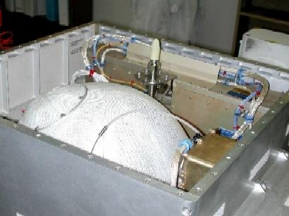 HCA with protective cover Figure 3. Photograph of flight HCA.004-F being integrated into the ISS PCU box. Image shows the PCU with its top cover removed.