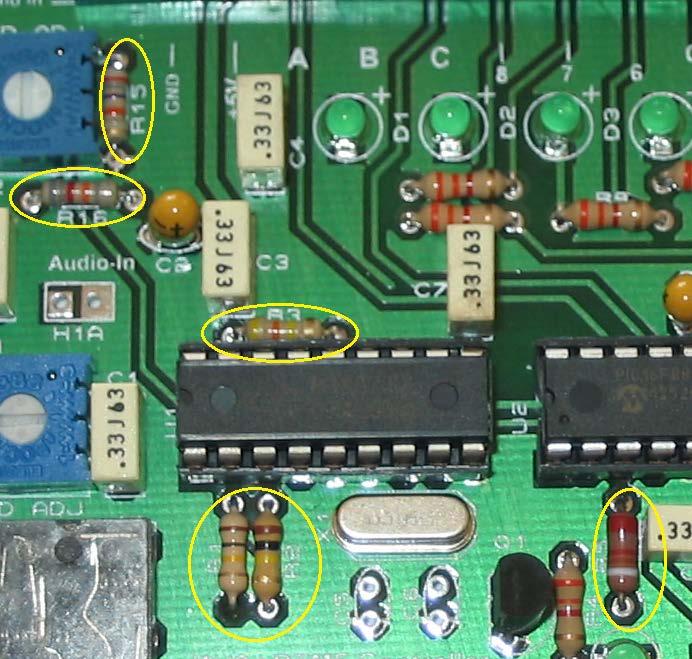 See picture for placement circled in yellow. Bend the leads back after inserting to keep the parts flush to the board. Solder all 10 resistors and cut the leads flush to the board.