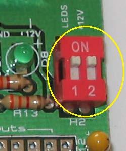 Use the mask on the board to show which way it is installed. Insert the NPN transistor.