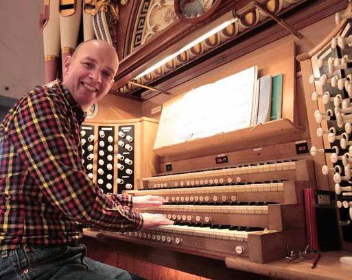 long-time Choir supporter and organ wizard - Gordon Stewart - at the hall s world-famous Father Willis organ s five