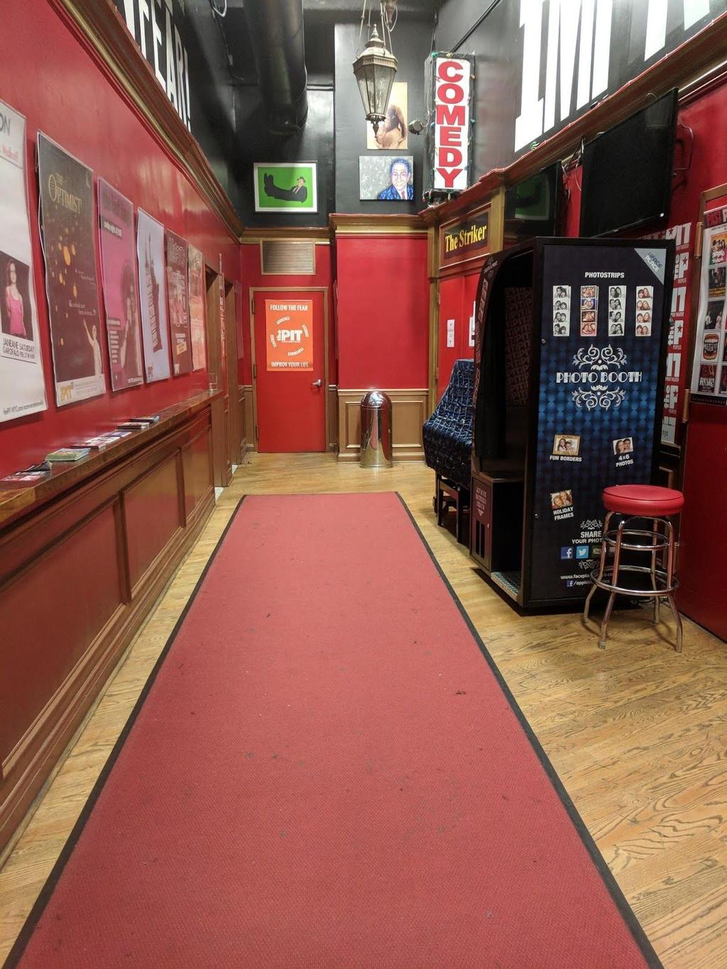 these red doors and down this hallway, which leads to the