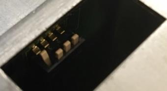 To access the switch, you will need to remove the access door on the top panel of the COM400 chassis as shown below in Figure 7.
