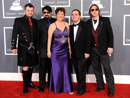 Photo by Chris Pizzello Miss Amy and Big Kids Band arrives at the 54th annual Grammy Awards on Sunday, Feb.