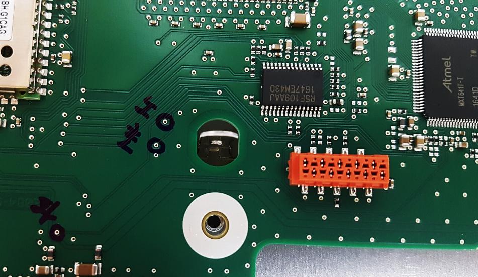 Please solder the provided Touch in/out cable to the marked point in the