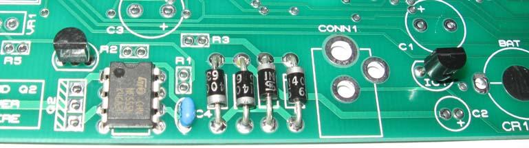 4 IC1 and Q1 IC1 and Q1 look very similar, so be careful to identify them correctly by the white marking on each component.
