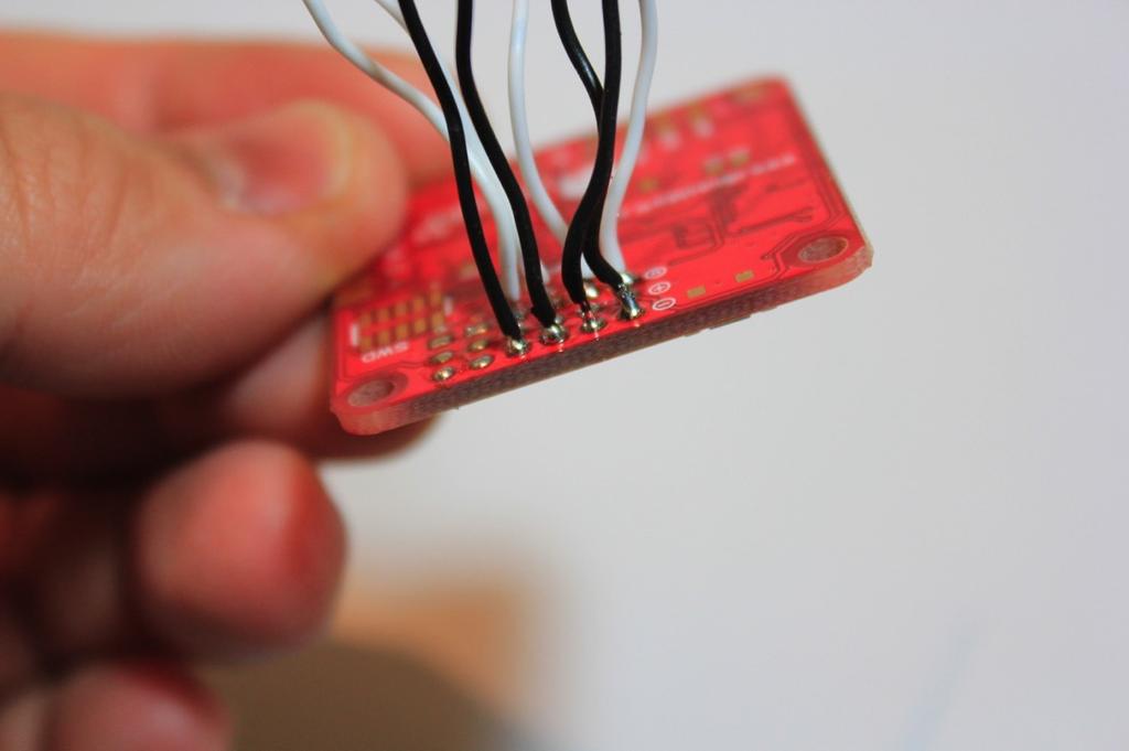 Solder signal and ground wires on the board.