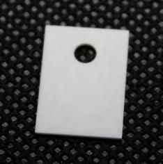Dimensions: 15mm x 21mm x 1mm thick with 4mm diameter hole Alumina Ceramic Insulator for TO220 Transistor Packages Part No: CER-INS-TO220 Description: