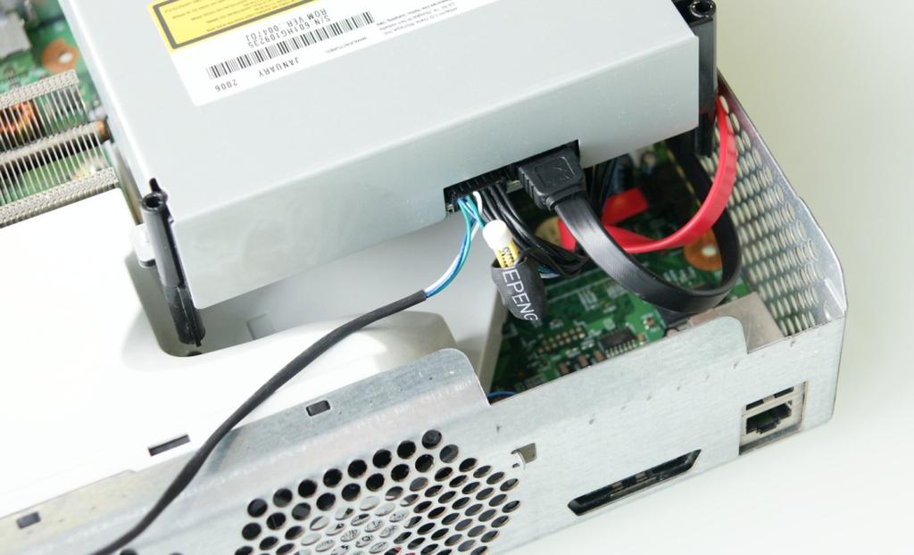 9. Insert the Black SATA cable and Wasabi Power Cable into the back of the drive as shown in Figure 9.