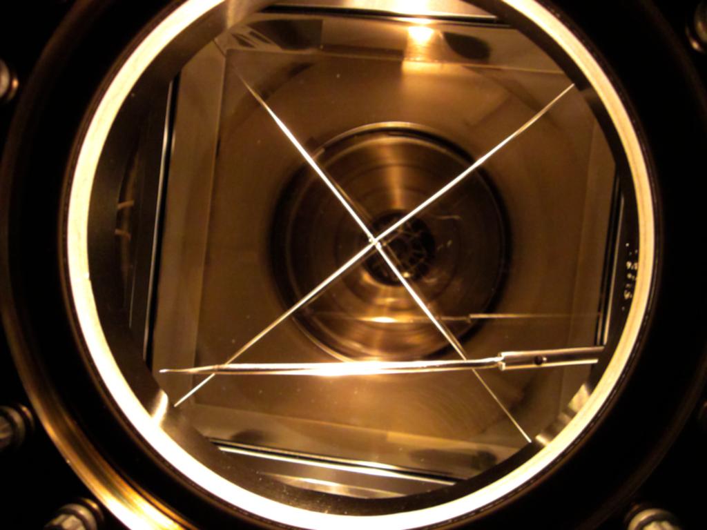 5.3 Photocathodes Figure 13 shows the first full-size photocathode made in the large-tank facility at the Space Sciences Laboratory.