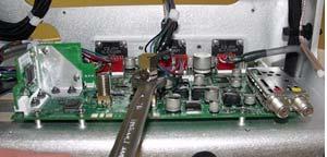 12. Reconnect the communication coax cable to the PCU PCB.