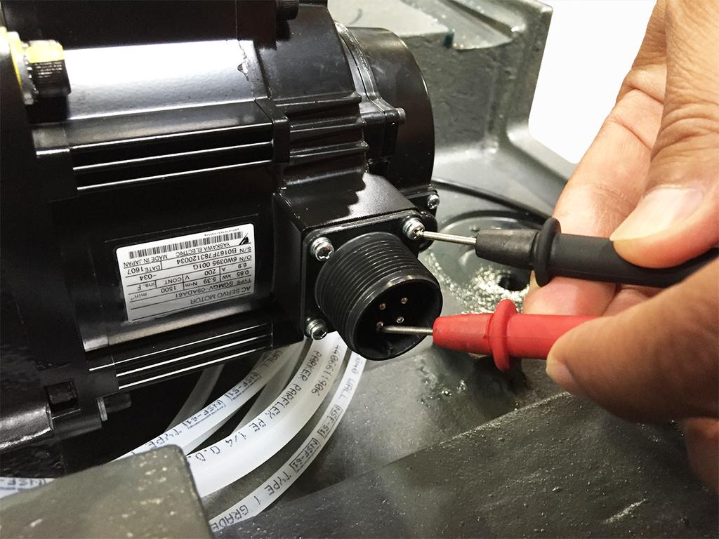 Servo Motor Corrective Action: Make sure the motor's connectors are not contaminated. Disconnect and inspect the power cable connector at the motor. Make sure that there is no coolant contamination.