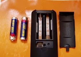 1.4.1 Insertion of Batteries in the Remote Control Insert two AA batteries into the remote control.