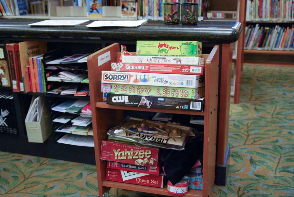 There are games, coloring sheets and crayons at the Children s Library desk.