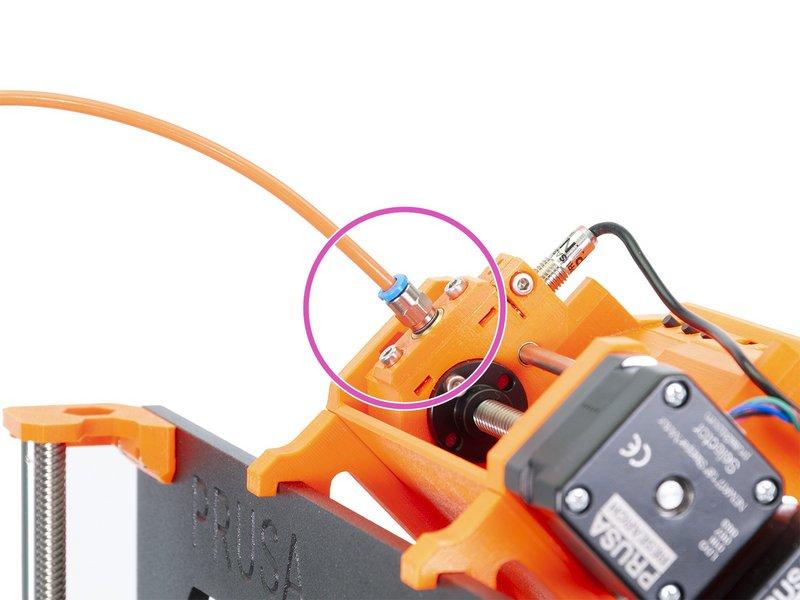 Take the second end of the tube and connect it to the MMU unit. Tighten the fitting using fingers.
