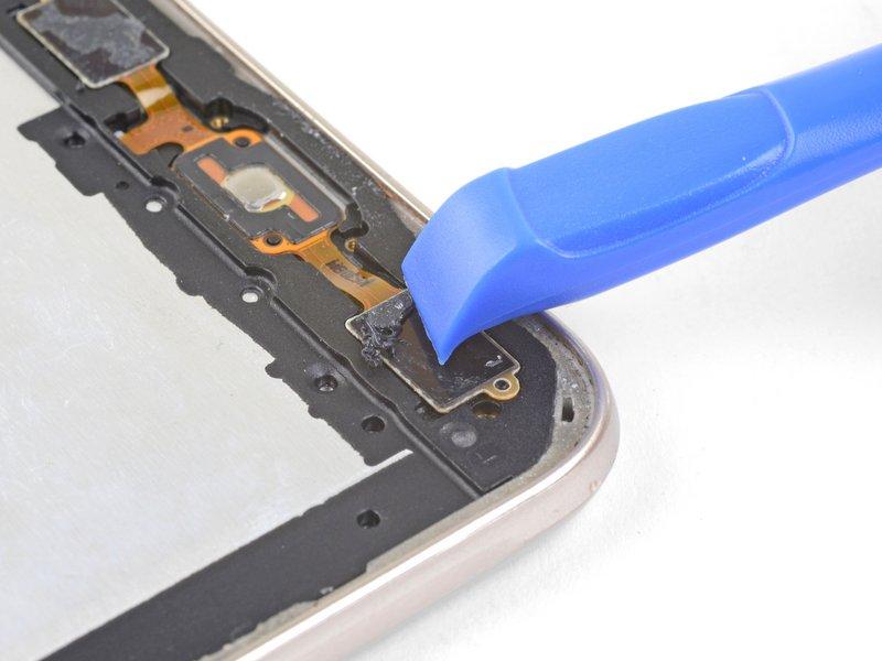 Connect your new screen by threading the display cable through the cutout and connecting it to the phone. Power on your phone and test it before re-adhering the screen.
