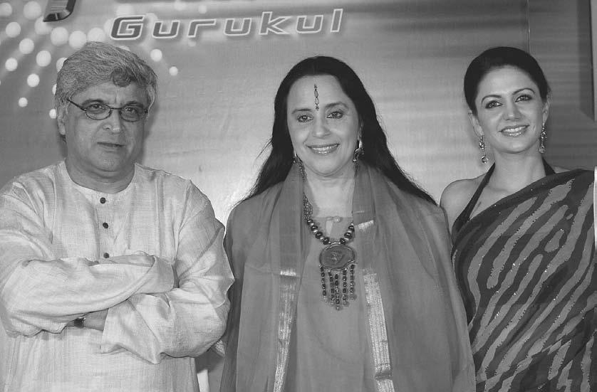 TELEVISION 163 Indian film lyricist, screenplay writer, and poet Javed Akhtar (left), singer Ila Arun (center), and actress Mandira Bedi (right) pose for photographers at the launch of Sony
