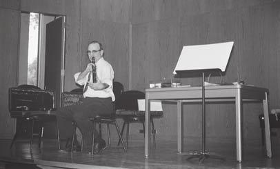 34 TRIBUTES TO LEWIS HUGH COOPER An early picture of Hugh demonstrating the air-tightness test for a bassoon long joint. From MICHAEL DIPIETRO, MD John F.