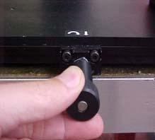 Lock the movable PCB fixture in this position.