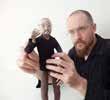 Portrait is a durational animation performance in which an amalgamated portrait of the participating audience is drawn by a stop-motion animated puppet. Sit down and take part!