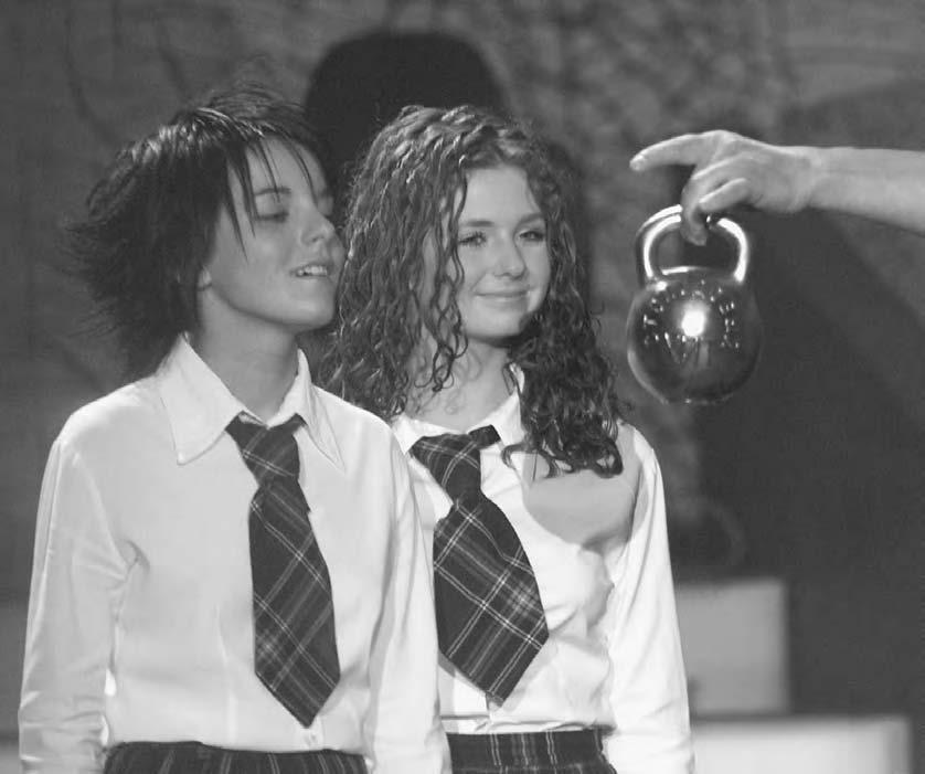 234 POP CULTURE RUSSIA! The girl band t.a.t.u takes part in the Stopudovyi Hit (Hundred-Pound Hit) Awards ceremony held by Hit-FM radio in the Kremlin Palace, 2001.