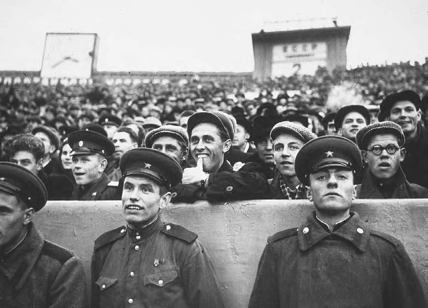 POPULAR ENTERTAINMENT 269 Disciplined soccer supporters watching a match at the Dinamo Stadium in Moscow in the early 1950s.