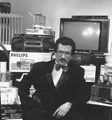 THE MEDIA 61 Vlad Listiev, the first director of ORT television, with the prizes for the game show Pole chudes, which he presented in the early 1990s.