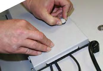 Route the cables to the proper inputs, and place the cable cords over the Rubber Sealing Gasket (Figure 2).