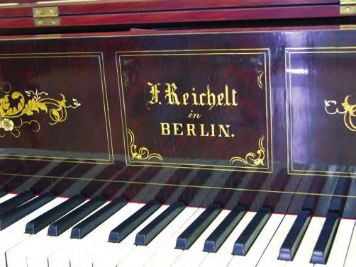 Reichelt Berlin Mahogany veneer, keyboard area stained dark.